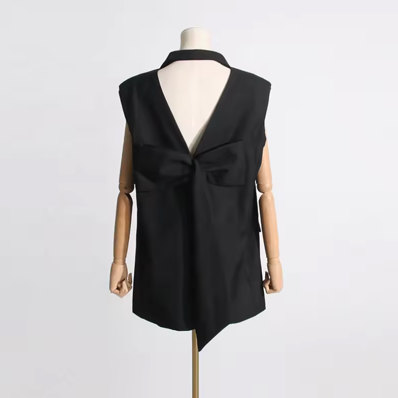 black vest with bow