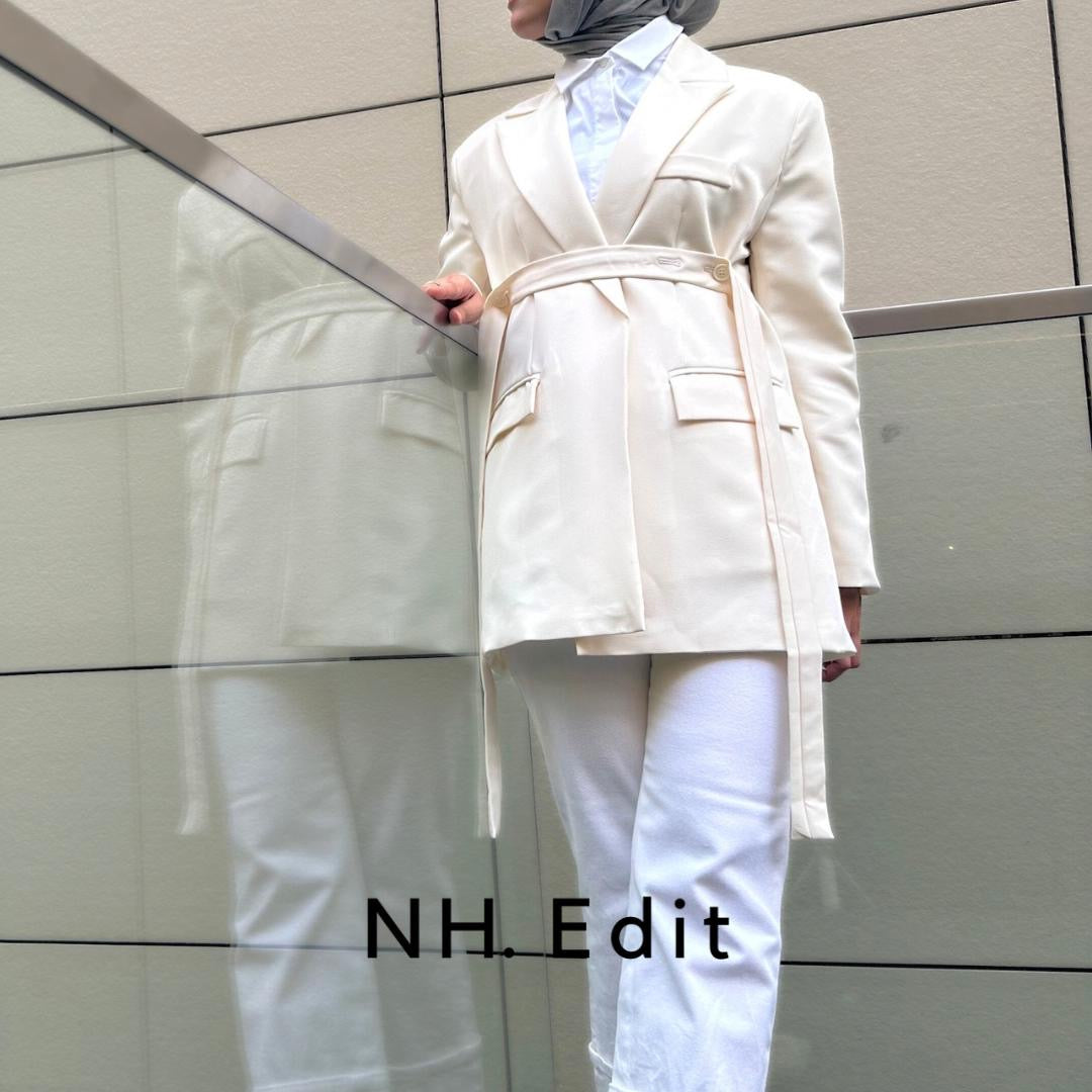white blazer with horizontal belt